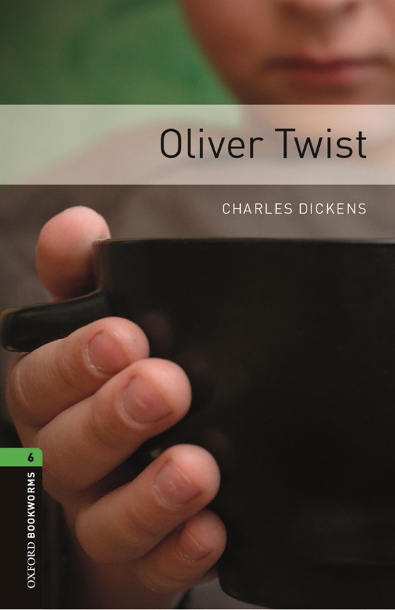 Oliver Twist book cover. A boy in a hat looking into the distance.